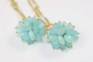 A close up of a pair of earrings