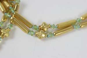 A close up of the beads on a necklace
