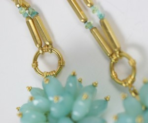 A close up of the necklace and bracelet