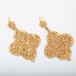 A pair of gold earrings with a chain link design.