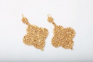 A pair of gold earrings with a chain link design.