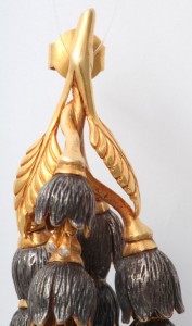 A close up of the back end of a statue