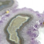 A close up of the purple and green agate