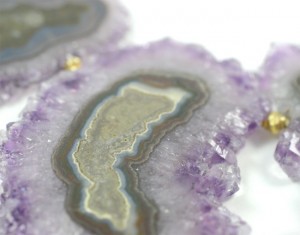 A close up of the purple and green agate