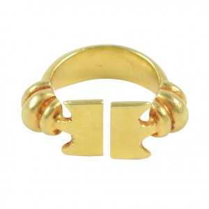 A gold ring with two pieces of metal