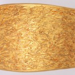A gold plate with some kind of food on it